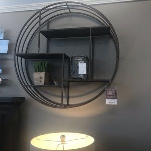 Round wood and metal wall shelf